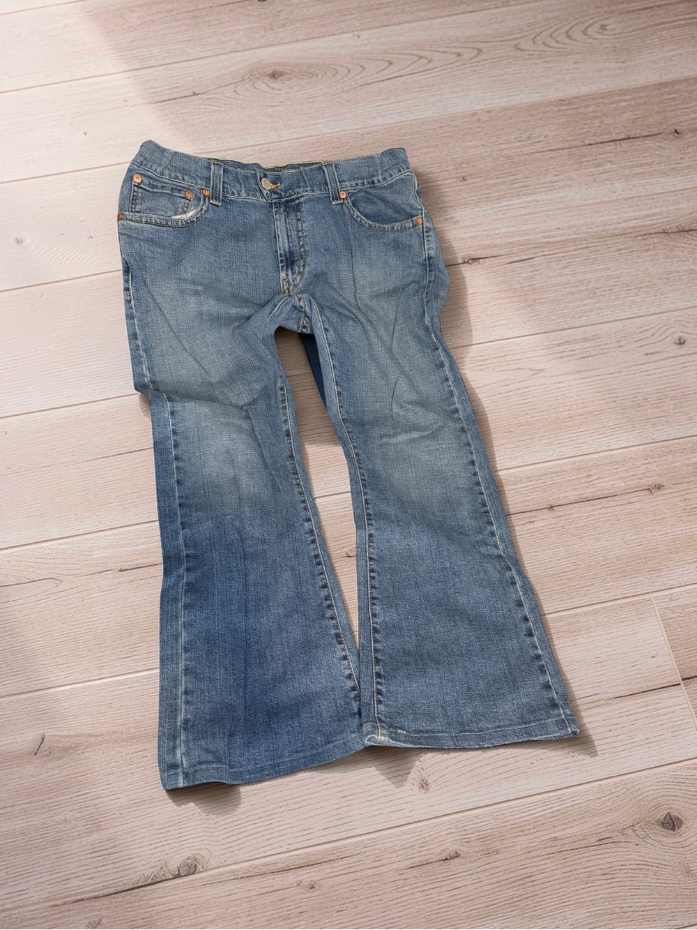 Levi’s Women’s Light Blue Flare Jeans with Subtle Fade